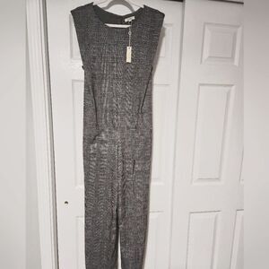 JUMPSUIT WARM  GRAY COLOR SIZE XL ON BUTTON LENGTH 44 INCH.